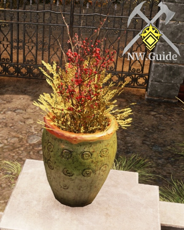 Pot of Winter Flowers placed on stone pillar