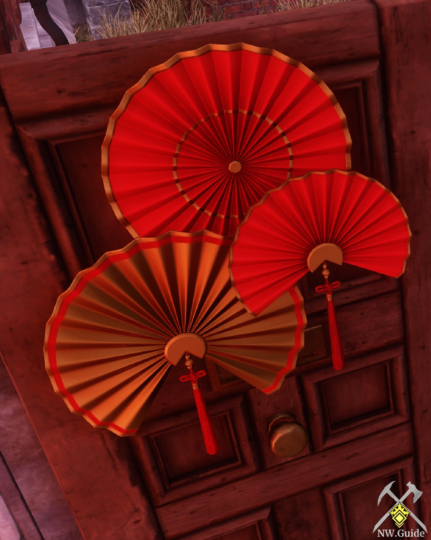 Warm Red Paper Fans on the wooden door