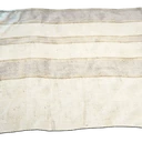 Icono del item "Alfombra de tela deshilachada"