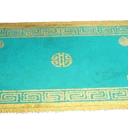 Icono del item "Alfombra geométrica turquesa"